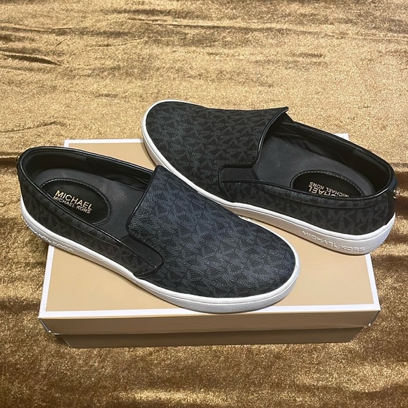 Michael Kors, black leather slip on shoe. Size 7. - Picture 1 of 4